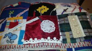 An example of a fidget quilt. Some sensory objects Imogene uses are keys, zippers, and buttons. 